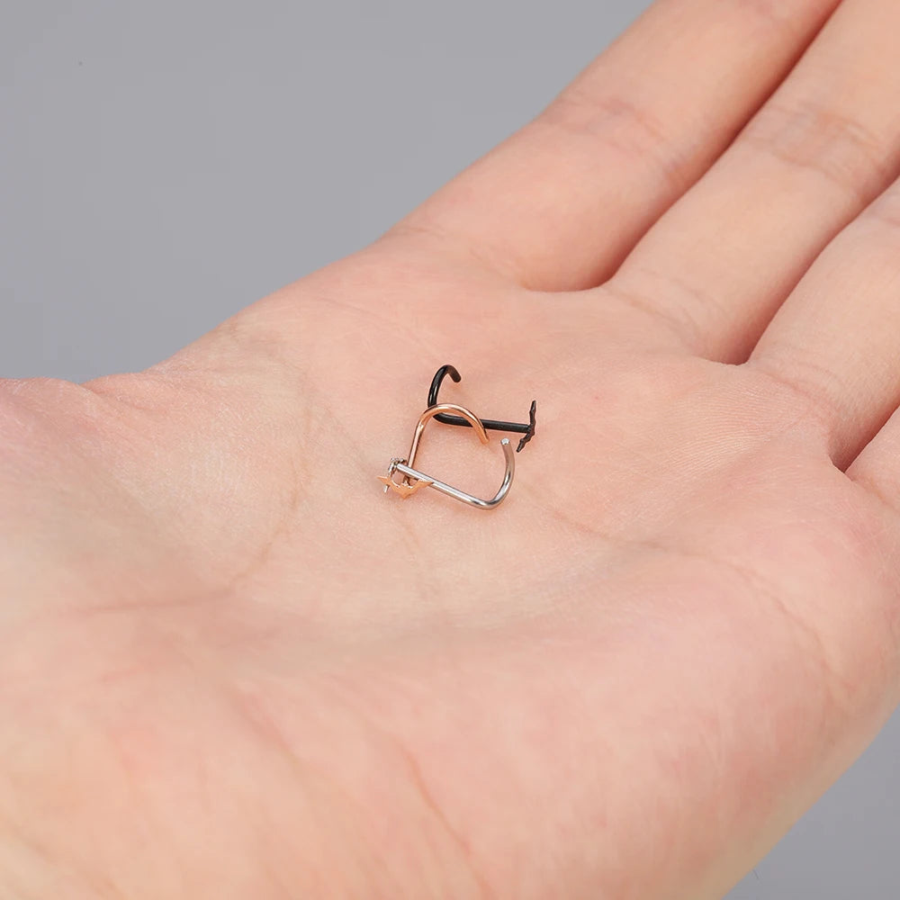 Stainless Steel nose stud of a 'screw' type with a tiny, itty bitty Gothic bat. Get your bat on with this tiny Goth nose stud!